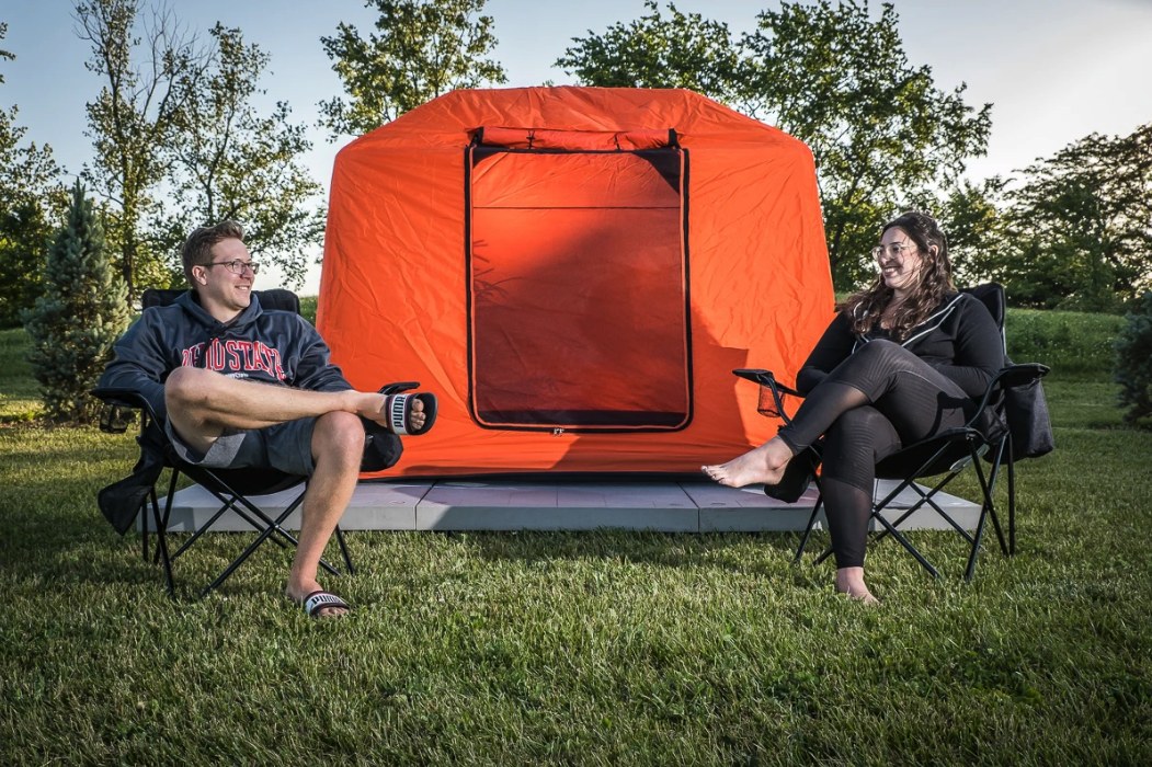 SmithFly pulls its inflatable glamping tent ashore on modular tent pad